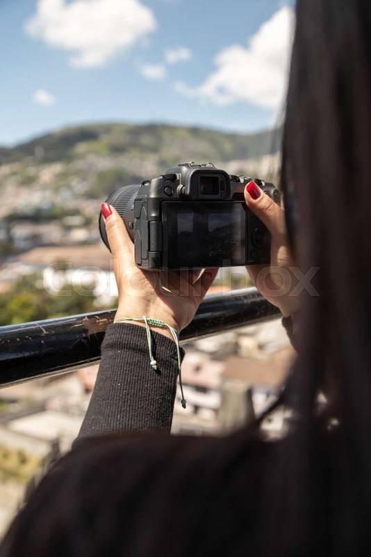 taking a photo with a professional digital camera a landscape