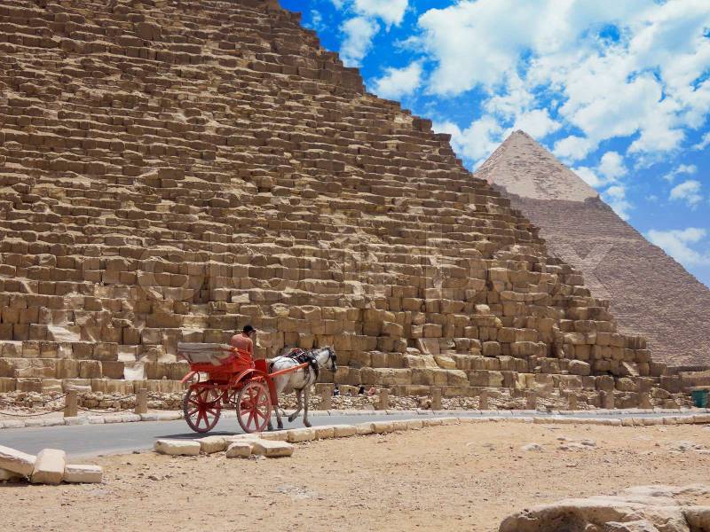 Egyptian pyramids in sand desert and clear sky