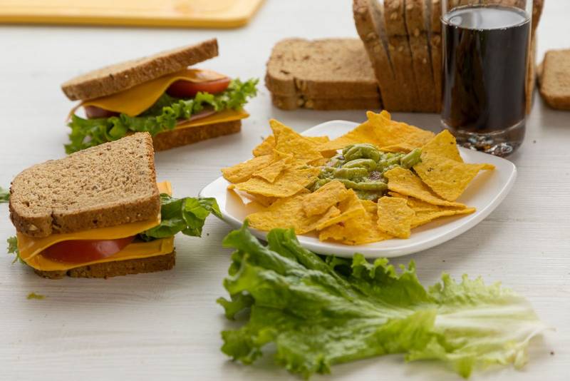 restaurant table prepared with sandwiches