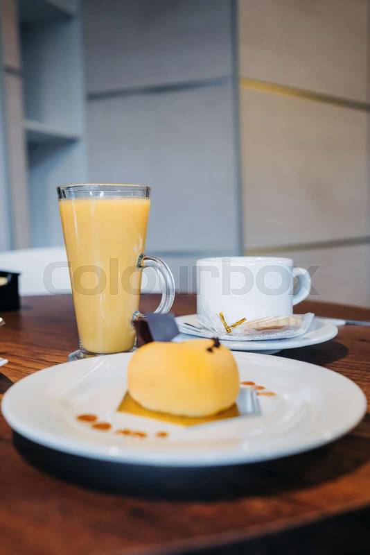 food and drinks, plate with cake decorated with icing, a cup of coffee