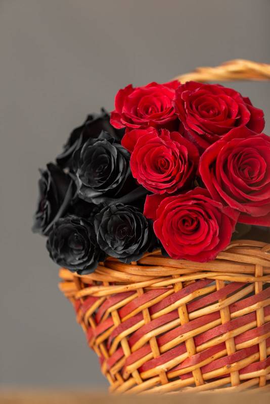 flower arrangement with black and red roses, natural nature arrangement