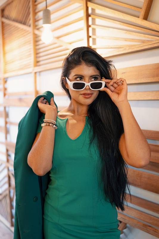 holding sunglasses in a sensual way, lifestyle and fashion