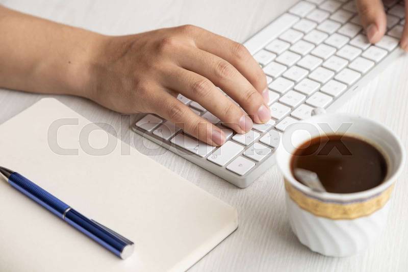 lifestyle in the workplace, hands of a person typing on a keyboard
