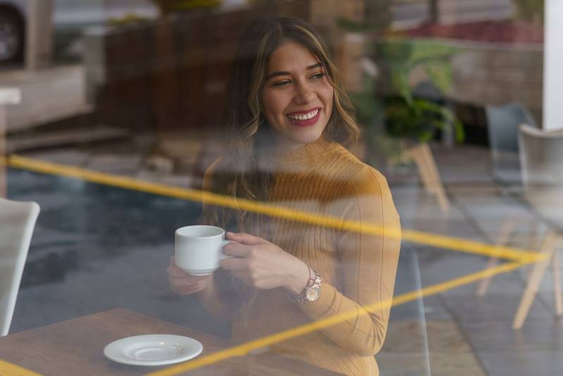 cafe interior having a cup of coffee, lifestyle and break