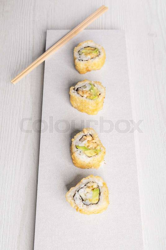 gourmet plate with four sushi rolls delicious traditional dish, sea food