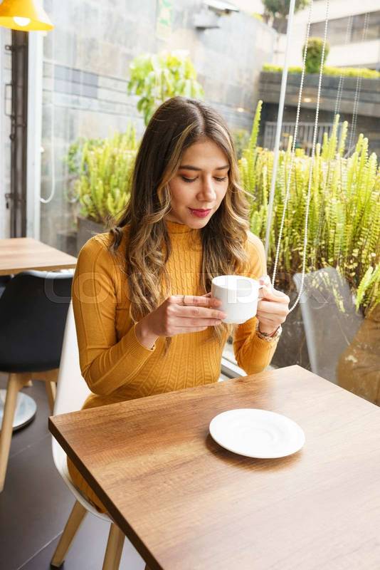 restaurant with a beautiful, young, latin woman